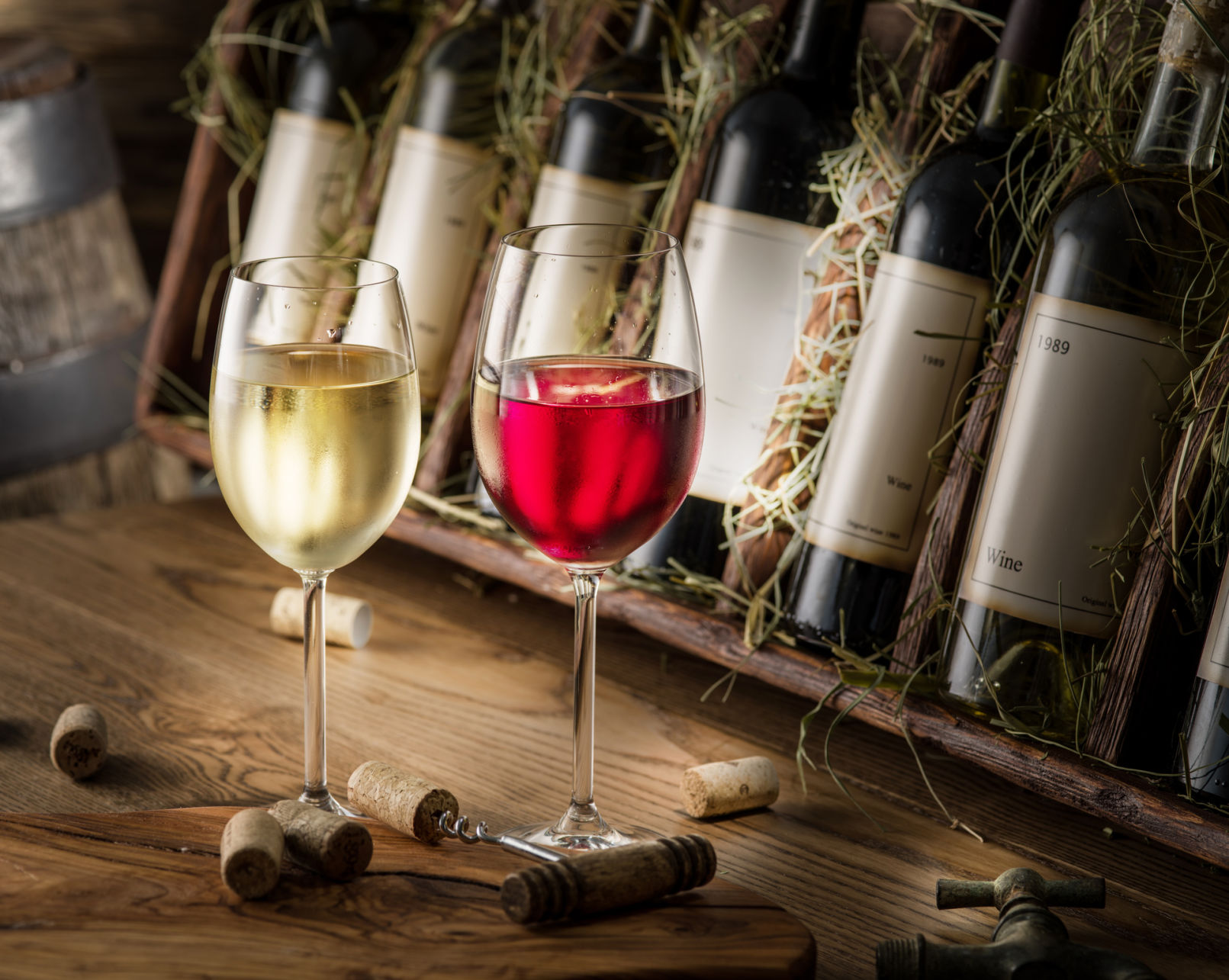 Glasses of wine with bottles